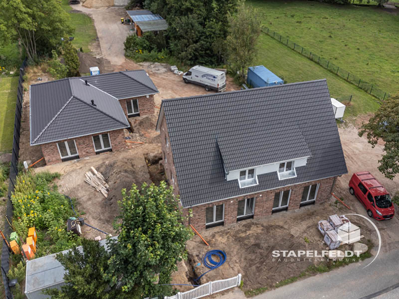 Bauunternehmen für Hamburg - Haus bauen in Altengamme - Neubau Einfamilienhaus plus Bungalow - privater Wohnungsbau / Wohnbau
