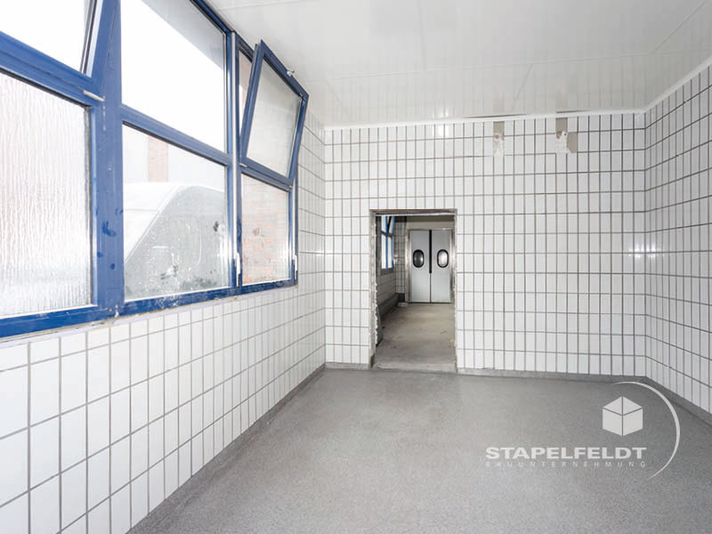 Bauunternehmen für Industriebau Bauunternehmen Umbau Schlachthof Verwaltungsgebäude Büroetage Hamburg Sankt Pauli Abbrucharbeiten Sanierung Fassade Denkmalschutz Sanierungsmaßnahmen Lagerhalle Werkshalle Industriegebäude Stapelfeldt Bauunternehmung