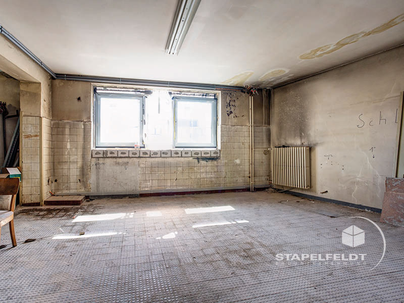 Bauunternehmen für Industriebau Bauunternehmen Umbau Schlachthof Verwaltungsgebäude Büroetage Hamburg Sankt Pauli Abbrucharbeiten Sanierung Fassade Denkmalschutz Sanierungsmaßnahmen Lagerhalle Werkshalle Industriegebäude Stapelfeldt Bauunternehmung