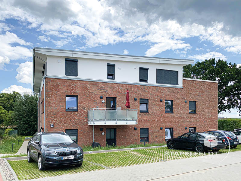Haus bauen Büchen Pötrau Bauunternehmen Neubau Neubauvorhaben Neubauwohnungen Hausbau Wohnhaus Energieeffizienz KfW55 barrierefreie Wohnungen DIN 18040-1/2 Mehrfamilienhäuser Raiffeisenbank eG Rohbau Großen Sandkamp Stapelfeldt Bauunternehmung
