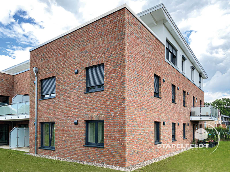 Haus bauen Büchen Pötrau Bauunternehmen Neubau Neubauvorhaben Neubauwohnungen Hausbau Wohnhaus Energieeffizienz KfW55 barrierefreie Wohnungen DIN 18040-1/2 Mehrfamilienhäuser Raiffeisenbank eG Rohbau Großen Sandkamp Stapelfeldt Bauunternehmung