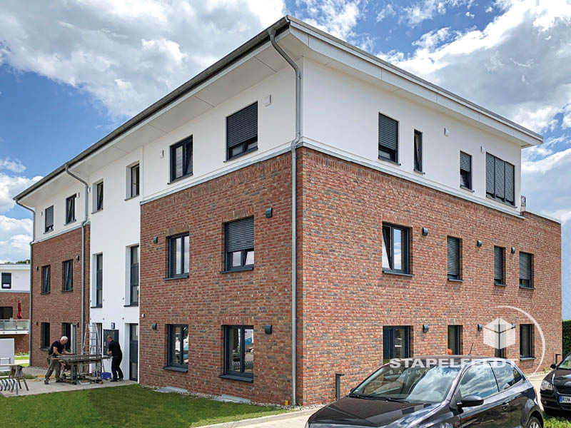 Haus bauen Büchen Pötrau Bauunternehmen Neubau Neubauvorhaben Neubauwohnungen Hausbau Wohnhaus Energieeffizienz KfW55 barrierefreie Wohnungen DIN 18040-1/2 Mehrfamilienhäuser Raiffeisenbank eG Rohbau Großen Sandkamp Stapelfeldt Bauunternehmung