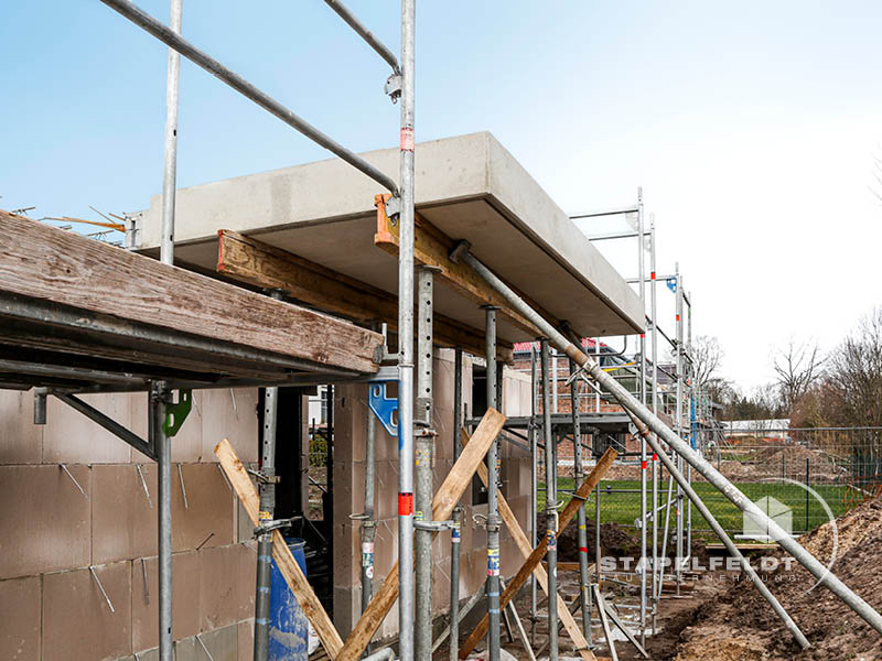 Haus bauen Büchen Pötrau Bauunternehmen Neubau Neubauvorhaben Neubauwohnungen Hausbau Wohnhaus Energieeffizienz KfW55 barrierefreie Wohnungen DIN 18040-1/2 Mehrfamilienhäuser Raiffeisenbank eG Rohbau Großen Sandkamp Stapelfeldt Bauunternehmung