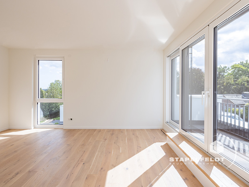 Stapelfeldt Bauunternehmung Geesthacht | Neubau in Bendestorf von einem Architektenhaus / Einfamilienhaus - zum Verkauf - mit Dachterrasse, Kamin, hochwertiger Ausstattung, energieeffizient