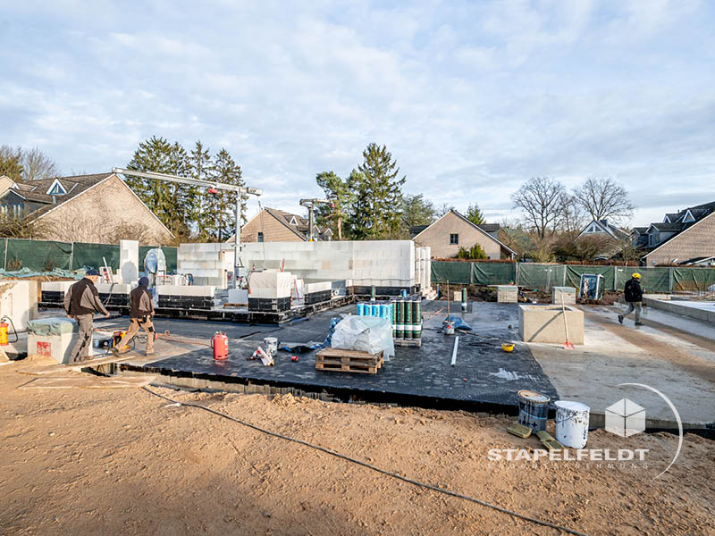 Bodenplatte mit Abdichtung und Materiallager – Wohnquartier Reiherstieg, Lüneburg | Bauunternehmen Stapelfeldt Bauunternehmung