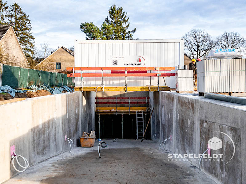 Betonschale einer künftigen Tiefgaragen-/Zufahrtsrampe im Wohnquartier Reiherstieg | Bauunternehmen Stapelfeldt Bauunternehmung
